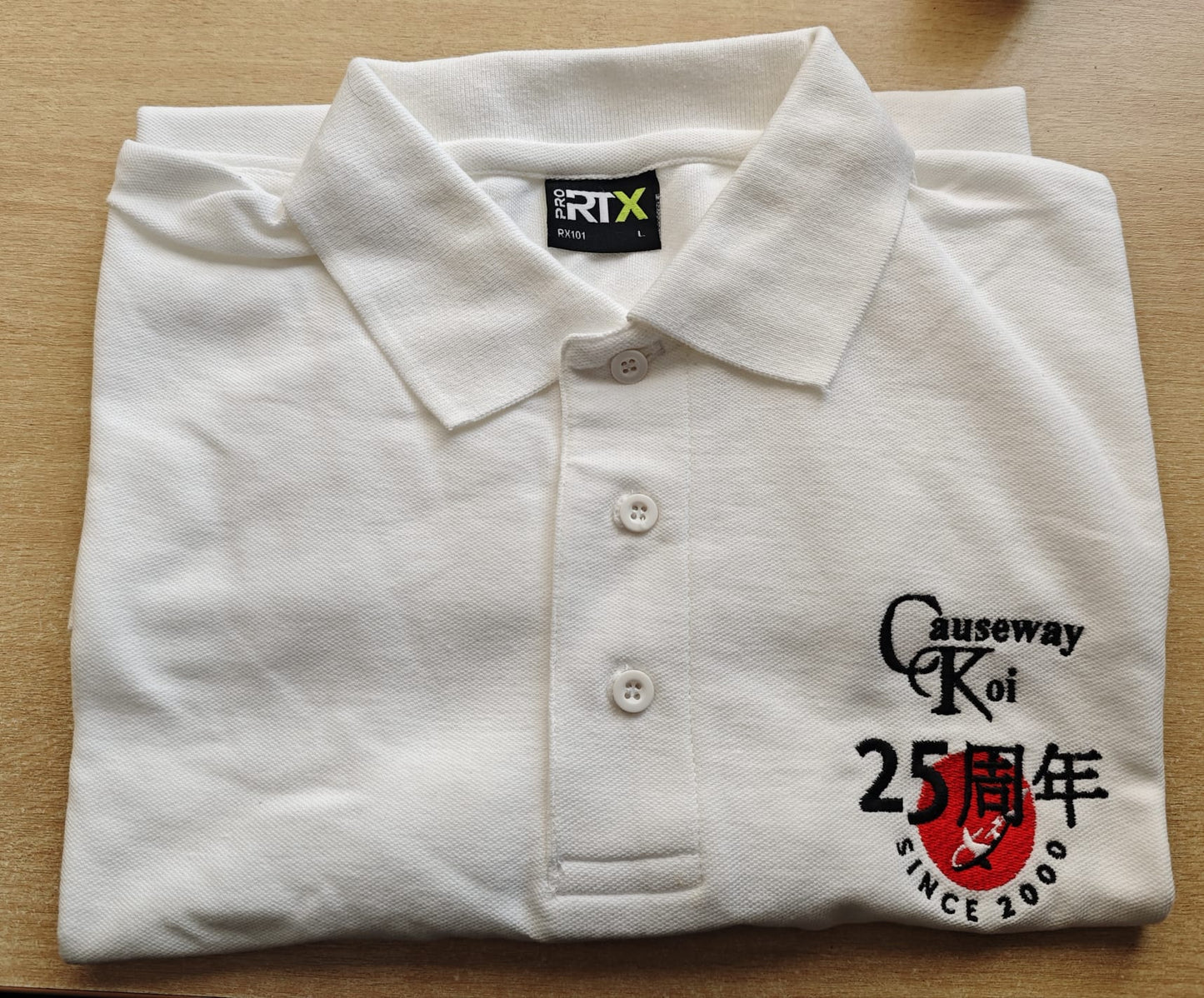 Free Causeway Koi 25th Anniversary Polo Shirt